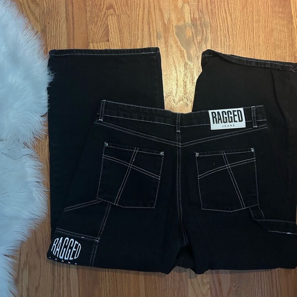 Ragged black jeans got in Paris with white stitching!